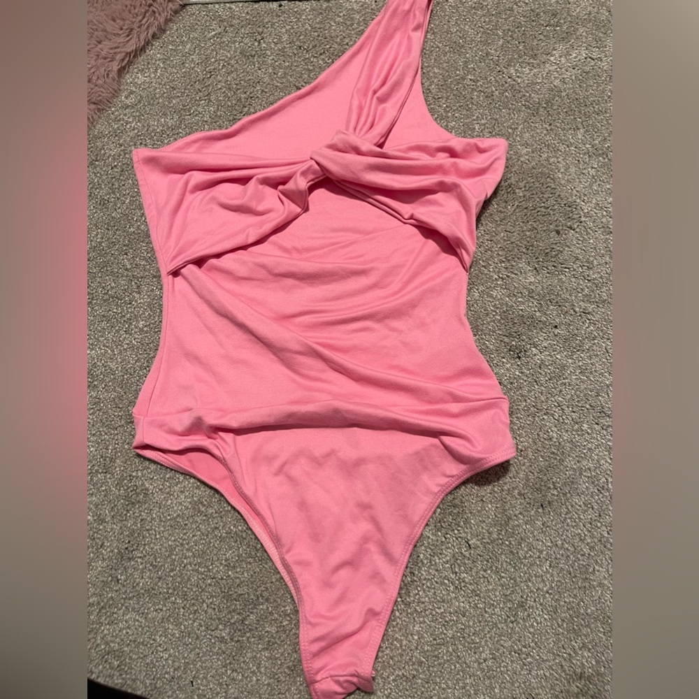 pink body suit